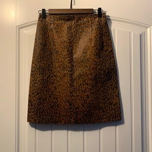Genuine leather Danier skirt with copper silk inside